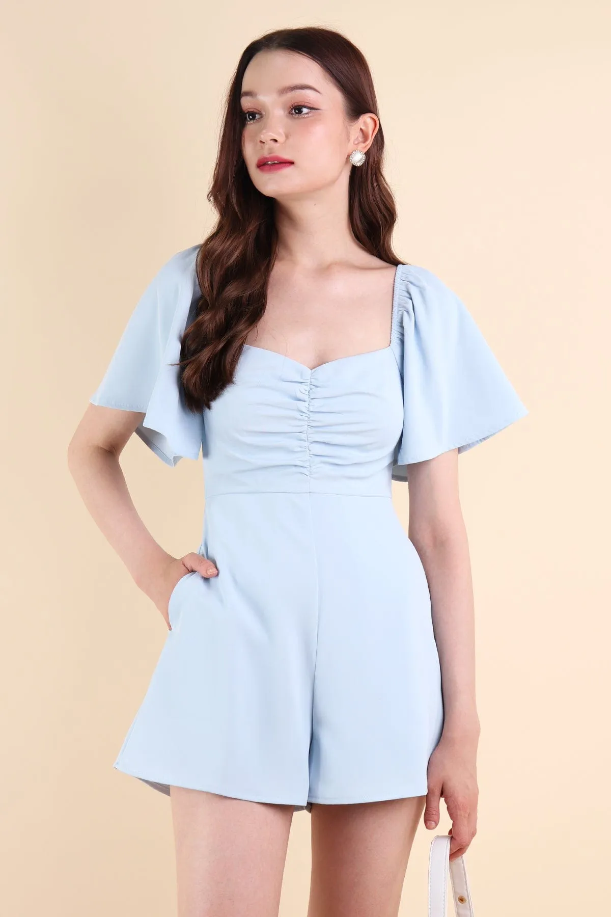 MEREDITH RUCHED ROMPER V2 IN SKY BLUE