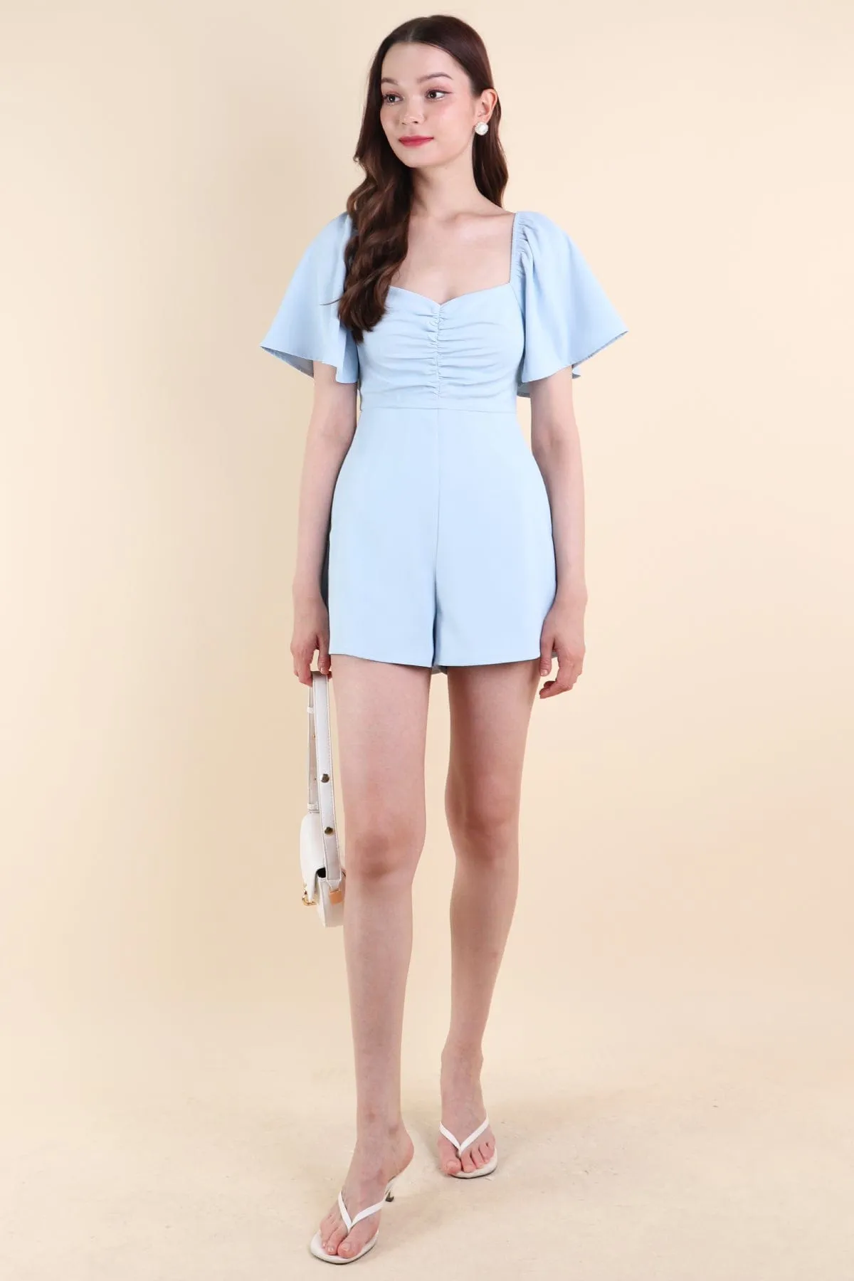 MEREDITH RUCHED ROMPER V2 IN SKY BLUE