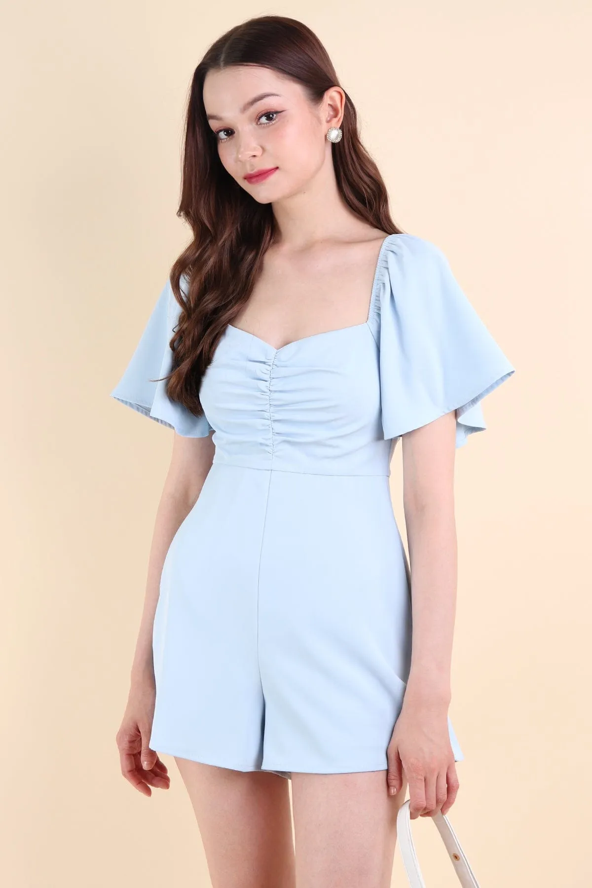 MEREDITH RUCHED ROMPER V2 IN SKY BLUE